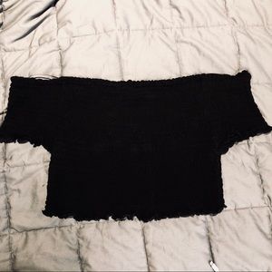 Black ruched crop top with lettuce hem